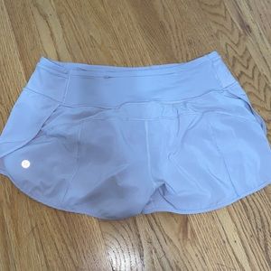 Light pink lululemon athletic shorts, size 6, practically brand new